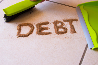 Sweeping away debt.