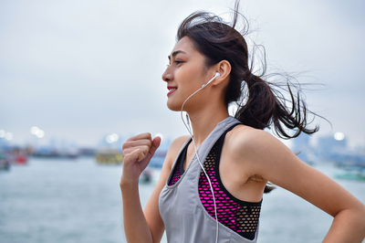 Woman running with headphones.