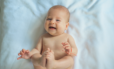 Baby smiling and laughing.