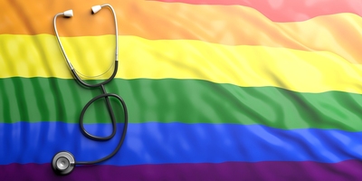 Rainbow flag with a stethoscope.