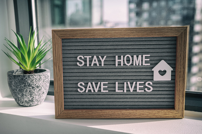 Stay home and save lives sign.